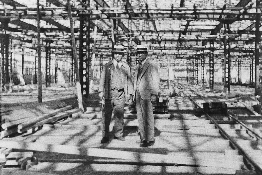 Kiichiro Toyoda inspecting the plant under construction