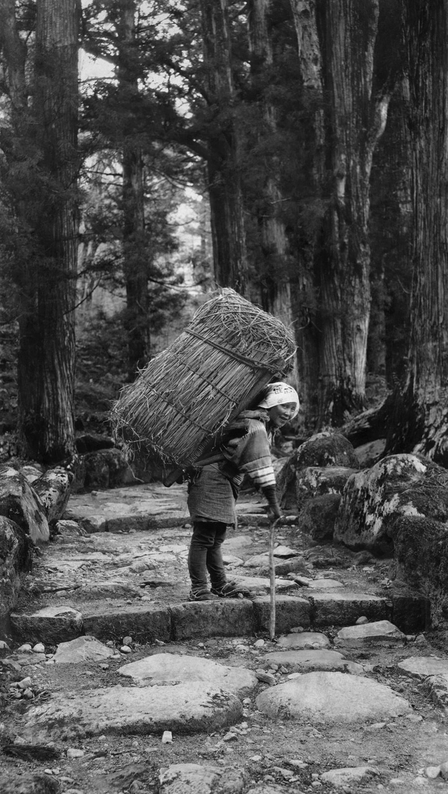 Fig. 1 Old Japanese woman carrying charcoal