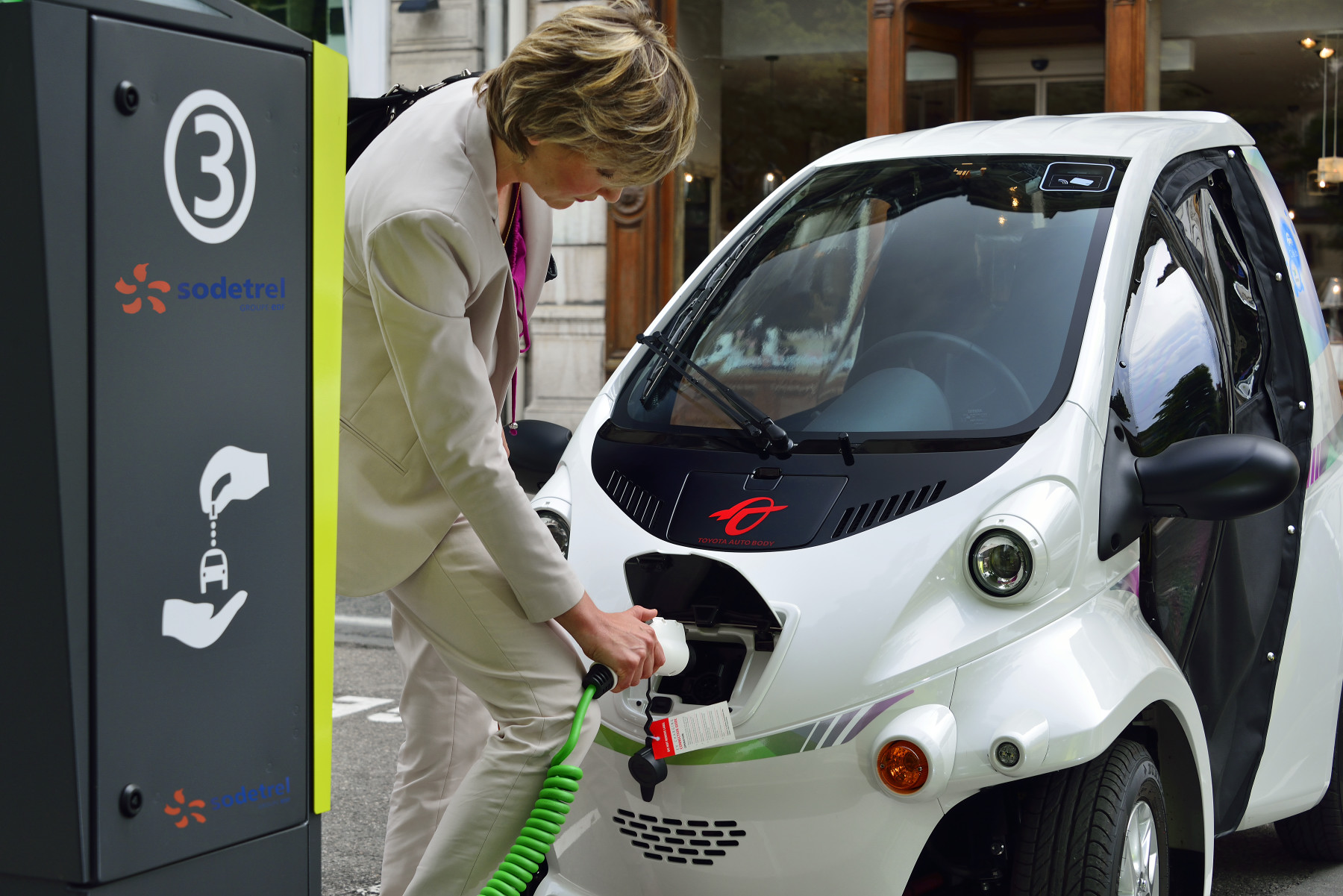 Toyota COMS at a charging station for 