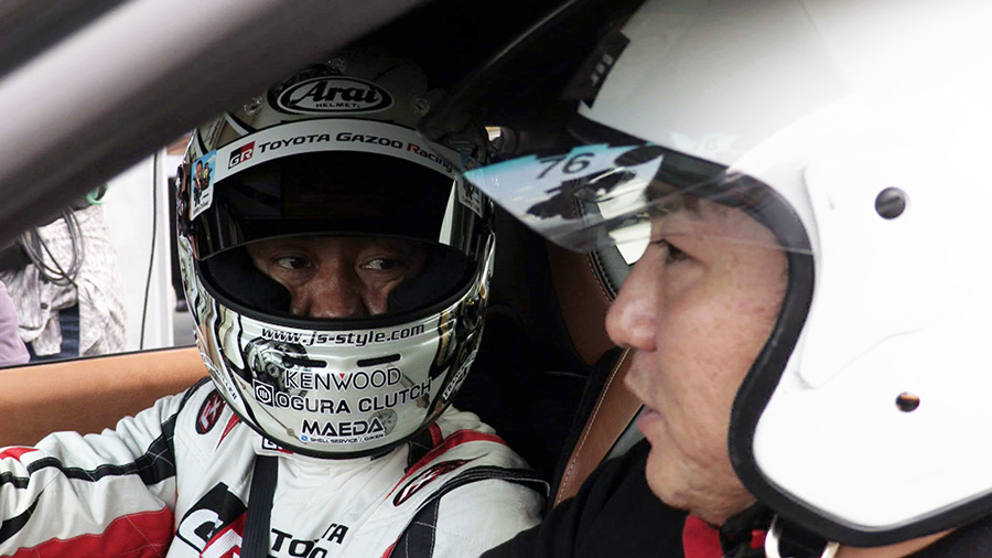 Racing Driver Juichi Wakisaka takes Morii on a ride at Fuji Speedway
