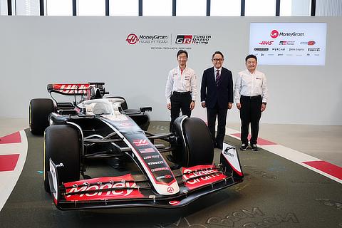 From left: MoneyGram Haas F1 Team Team Principal Ayao Komatsu, Toyota Motor Corporation Chairman Akio Toyoda, and GAZOO Racing Company President Tomoya Takahashi