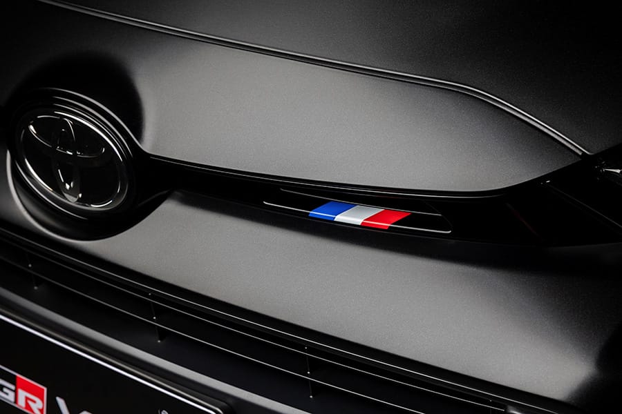 GR Yaris S&eacute;bastien Ogier 9x World Champion Edition (Prototype) Tricolor-decorated radiator grille