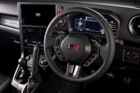 GR Yaris Sébastien Ogier 9x World Champion Edition (Prototype) Leather-wrapped vertical parking brake lever & cover with gray stitching