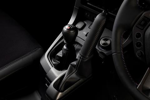 GR Yaris Sébastien Ogier 9x World Champion Edition (Prototype) Leather-wrapped vertical parking brake lever & cover with gray stitching