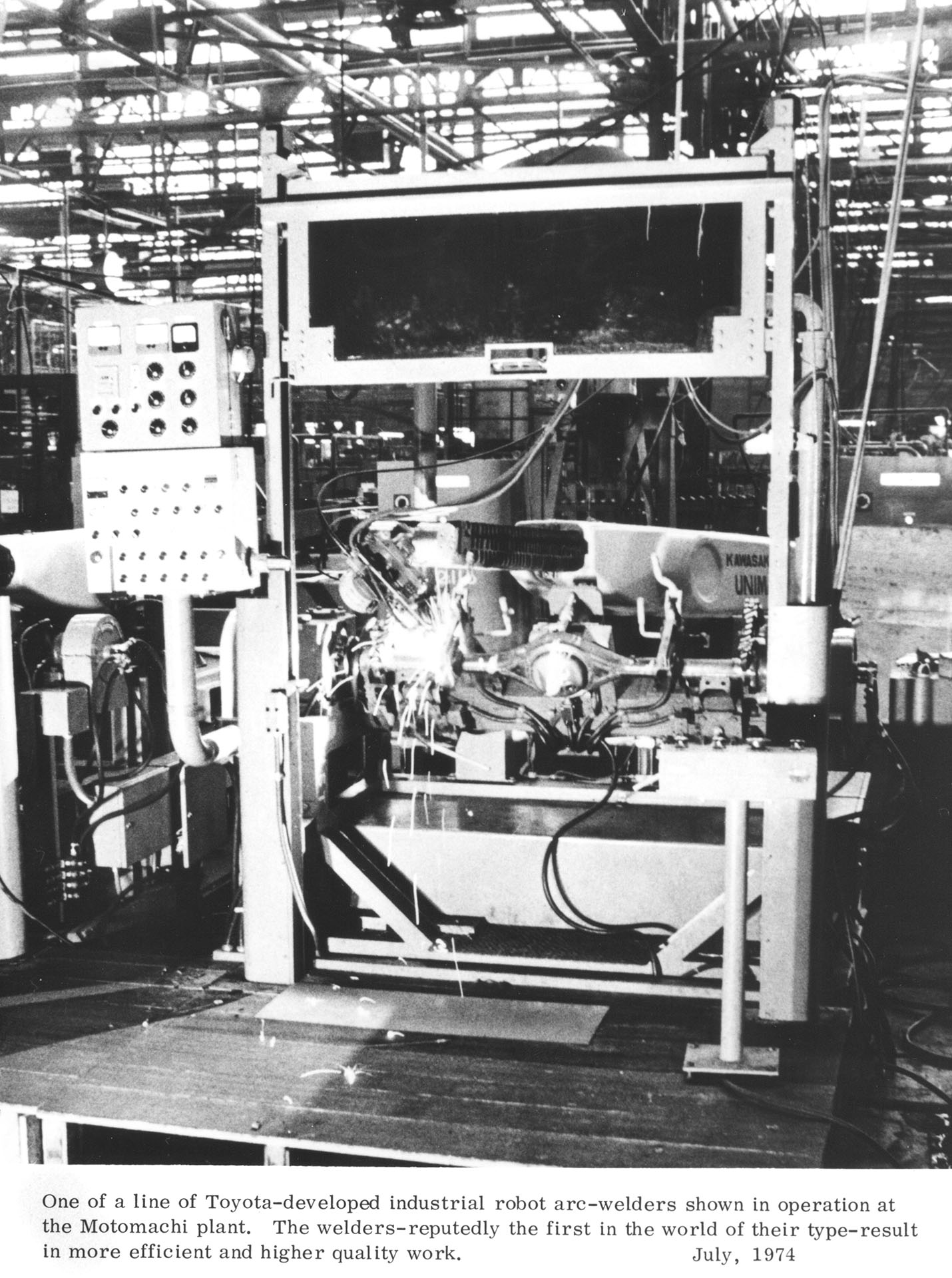 One of a line of Toyota-developed industrial robot arc-welders shown in operation at the Motomachi plant. The welders-reputedly the first in the world of their type-result in more efficient and higher quality work.