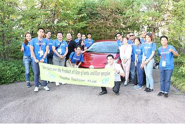 Group photo at Tsutsumi plant